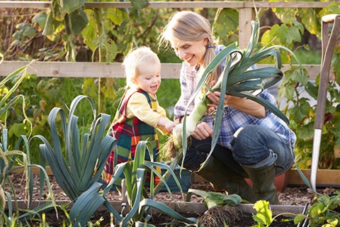 Community-garden-woman-and-child.jpg